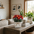 Handmade Fuzzy Flower Potted Arrangement with red chenille flowers and yellow centers in a white wooden pot with jute bow
